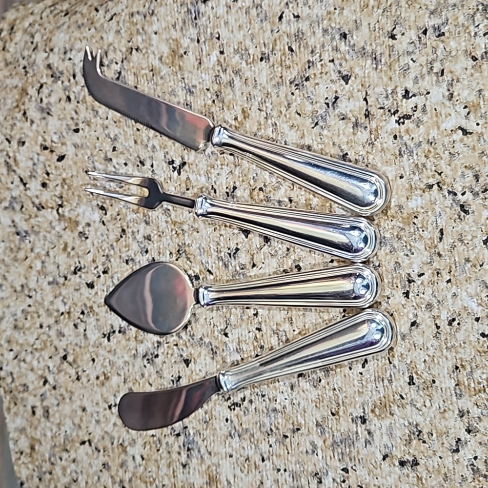 Pottery Barn Vintage  4-piece Stainless Steel Cheese Serving Utensils Set.